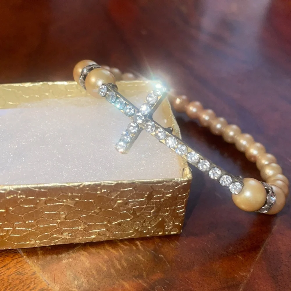 - New crystal cross stretch bracelet peach os